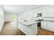 Modern kitchen featuring granite countertops and stainless steel appliances at 756 Long Bluff Rd, Summerville, SC 29486