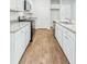 Modern kitchen with white cabinets and granite countertops at 756 Long Bluff Rd, Summerville, SC 29486