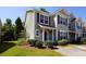 Tan two-story home with dark shutters and landscaping at 2429 Scholar Ln, North Charleston, SC 29406
