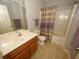 Clean bathroom with shower/tub combo, vanity and toilet at 2429 Scholar Ln, North Charleston, SC 29406