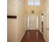 Two-story entryway with hardwood floors, high ceilings, and plenty of natural light at 2429 Scholar Ln, North Charleston, SC 29406