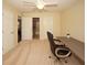 Bright bedroom with carpet flooring, built-in desk, and access to bathroom at 2429 Scholar Ln, North Charleston, SC 29406