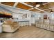 Open living room with kitchen bar and comfortable seating at 144 Palmetto Blvd, Edisto Island, SC 29438