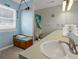 Bathroom with double sinks and shower at 144 Palmetto Blvd, Edisto Island, SC 29438