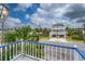 View from balcony showing the street and neighboring houses at 144 Palmetto Blvd, Edisto Island, SC 29438