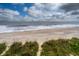 Beach access with dune vegetation at 144 Palmetto Blvd, Edisto Island, SC 29438