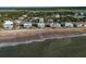 Beachfront property view showcasing home's location and proximity to the ocean at 144 Palmetto Blvd, Edisto Island, SC 29438