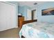 Bedroom with queen bed and built-in TV at 144 Palmetto Blvd, Edisto Island, SC 29438