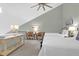 Two twin beds in a loft-style bedroom with seating area at 9002 Palmetto Dr # 512, Isle of Palms, SC 29451