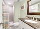 Clean bathroom with granite countertop, shower, and white vanity at 9002 Palmetto Dr # 512, Isle of Palms, SC 29451