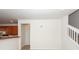 View of the staircase and entry to kitchen at 1151 Saint Pauls Parrish Ln, Johns Island, SC 29455
