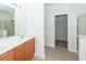 Double vanity bathroom with shower and tub at 1151 Saint Pauls Parrish Ln, Johns Island, SC 29455