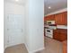 Bright entryway with tile flooring and access to kitchen at 1151 Saint Pauls Parrish Ln, Johns Island, SC 29455