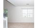 Bright living room with large window and carpet flooring at 1151 Saint Pauls Parrish Ln, Johns Island, SC 29455