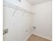 Laundry room with wire shelving and tile floor at 1151 Saint Pauls Parrish Ln, Johns Island, SC 29455