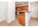 Kitchen features wood cabinets and white appliances at 1151 Saint Pauls Parrish Ln, Johns Island, SC 29455