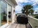 Deck with built-in grill and access to kitchen at 3002 Palmetto Blvd # 6, Edisto Beach, SC 29438