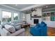 Spacious living room with a fireplace and built in shelving at 3002 Palmetto Blvd # 6, Edisto Beach, SC 29438