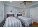 Twin bedroom with blue headboards and striped bedding at 3002 Palmetto Blvd # 6, Edisto Beach, SC 29438