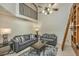 Living room with two sofas, coffee table, and loft access at 377 King St # 101, Charleston, SC 29401