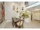 Dining area with exposed brick wall and wooden table at 377 King St # 101, Charleston, SC 29401