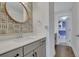 Small bathroom with a vanity and a view into a bedroom at 601 Yellow Leaf Ln, Summerville, SC 29486