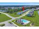 Aerial view of a home in a neighborhood with a community pool at 601 Yellow Leaf Ln, Summerville, SC 29486