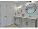 Bathroom with double vanity and shiplap feature wall at 601 Yellow Leaf Ln, Summerville, SC 29486