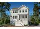 Two-story home with white siding and front porch at 1709 Vireo Ct, Johns Island, SC 29455