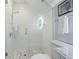 Bright bathroom with a large walk-in shower and pebble floor at 110 W 2Nd South St, Summerville, SC 29483