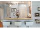 Open kitchen with granite countertops and light wood cabinets at 200 River Landing Dr # 105F, Charleston, SC 29492