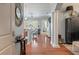 Bright entryway with hardwood floors, leading to a spacious living area at 200 River Landing Dr # 105F, Charleston, SC 29492