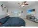 Main bedroom with king bed, large TV, and plenty of natural light at 513 Abigail St, Moncks Corner, SC 29461
