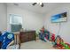 bedroom with dresser, crib, and toys at 513 Abigail St, Moncks Corner, SC 29461