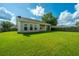 Large backyard with home and patio at 513 Abigail St, Moncks Corner, SC 29461