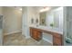 Double vanity bathroom with a large mirror and plenty of counter space at 513 Abigail St, Moncks Corner, SC 29461