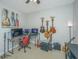 Home office or music room with multiple guitars, work station, and two computer monitors at 513 Abigail St, Moncks Corner, SC 29461