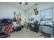 Home office or music room with multiple guitars, work station, and two computer monitors at 513 Abigail St, Moncks Corner, SC 29461