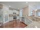Updated kitchen featuring stainless steel appliances, granite countertops, and hardwood floors at 1405 Tannery Row, Johns Island, SC 29455