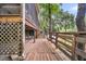 Wooden deck leads to backyard and waterfront view at 410 Four Holes Road, Dorchester, SC 29437