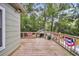 Large wooden deck overlooks peaceful wooded area at 410 Four Holes Road, Dorchester, SC 29437