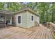 Expansive deck wraps around home's corner, offering ample outdoor space at 410 Four Holes Road, Dorchester, SC 29437