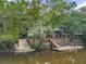 Waterfront home with private dock and lush landscape at 410 Four Holes Road, Dorchester, SC 29437