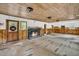 Spacious living area with fireplace, ready for renovation at 410 Four Holes Road, Dorchester, SC 29437