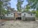 Quaint cottage style home with mature trees surrounding at 410 Four Holes Road, Dorchester, SC 29437
