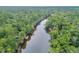 Aerial view of riverfront home with dock at 410 Four Holes Road, Dorchester, SC 29437