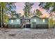Charming raised cottage with deck, and spacious backyard at 410 Four Holes Road, Dorchester, SC 29437