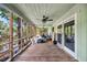 Large screened porch overlooking a tranquil waterway at 410 Four Holes Road, Dorchester, SC 29437