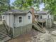 Inviting cottage exterior, featuring a deck and stairs at 410 Four Holes Road, Dorchester, SC 29437