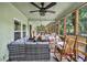 Relaxing screened porch with wicker furniture and river view at 410 Four Holes Road, Dorchester, SC 29437